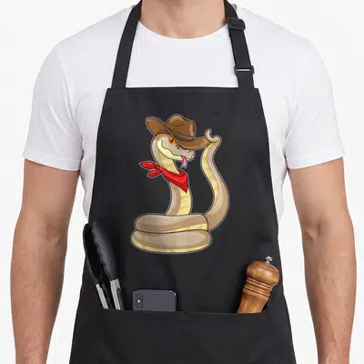 Tablier de cuisine noir avec un serpent cowboy au chapeau brown et foulard rouge.