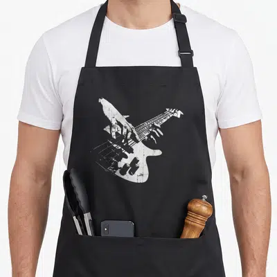 Tablier de cuisine noir avec illustration blanche d'une main jouant d'une guitare basse au style vintage et égréné.