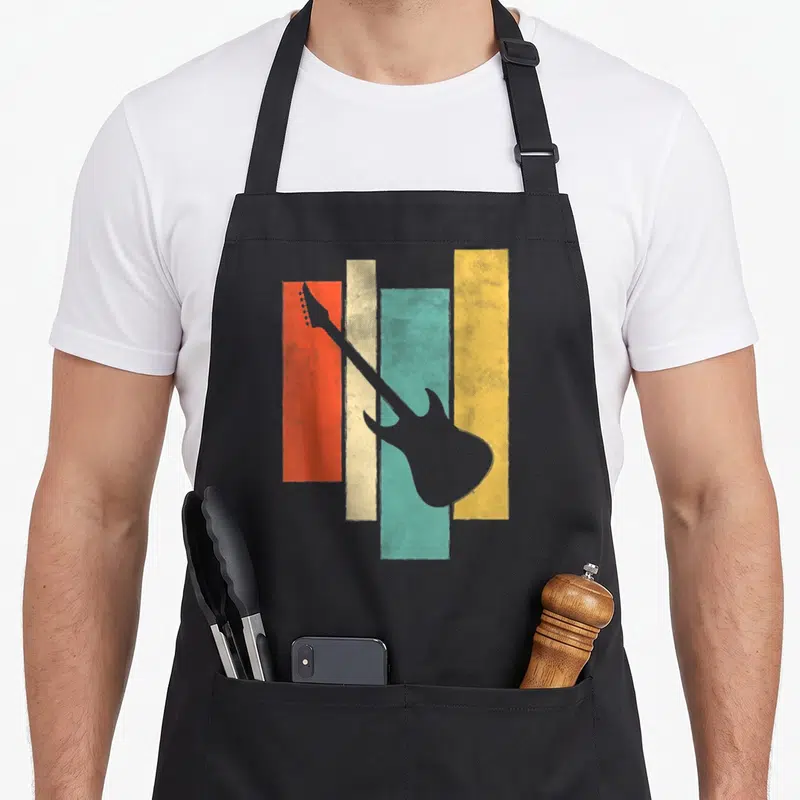 Tablier de cuisine noir avec silhouette de guitare électrique sur bandes colorées vintage orange jaune et turquoise
