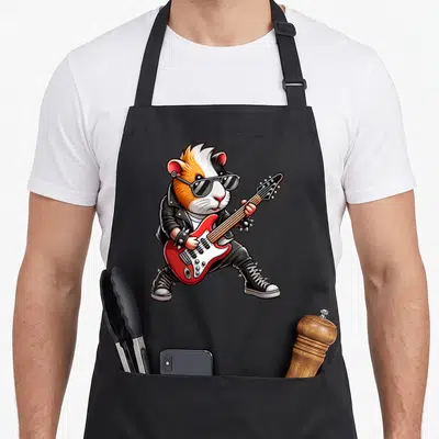 Tablier de cuisine noir avec illustration d'un guinea-pig rockeur jouant d'une guitare électrique rouge, portant des lunettes noires et une veste en cuir.
