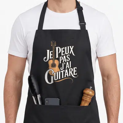 Tablier de cuisine noir avec illustration de guitare acoustique orange et texte blanc Je peux pas j'ai guitare.