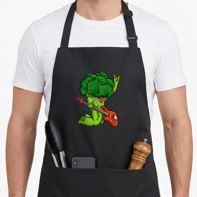 Tablier de cuisine noir avec un brocoli vert jouant d'une basse électrique rouge et faisant un signe derock.
