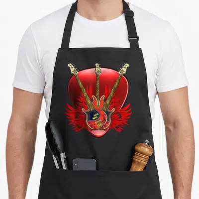 Tablier de cuisine noir avec trois basses aux ailes rouges et un plectre en arrière-plan.