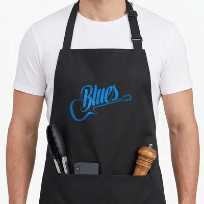 Tablier de cuisine noir avec inscription Blues et silhouette de guitare électrique en bleu vif.