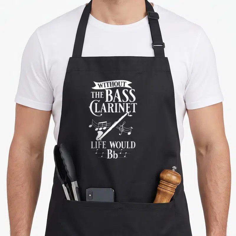 Tablier de cuisine noir avec illustration blanche d'une clarinette basse et texte sans col.