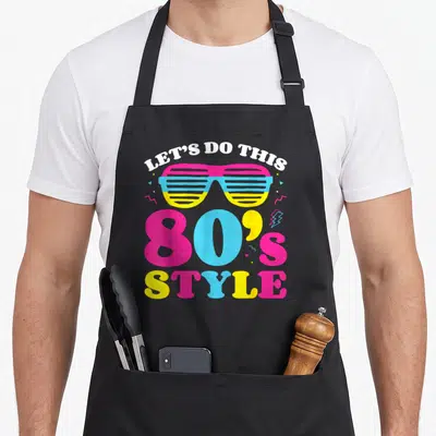 Tablier de cuisine noir avec motif 80s Style lunettes roses et éclairs jaunes bleus