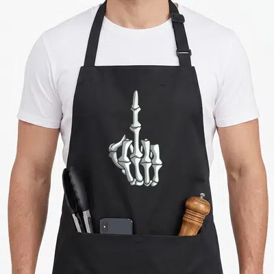 Tablier de cuisine noir avec une illustration d'une main de squelette levant le majeur en signe de mépris.