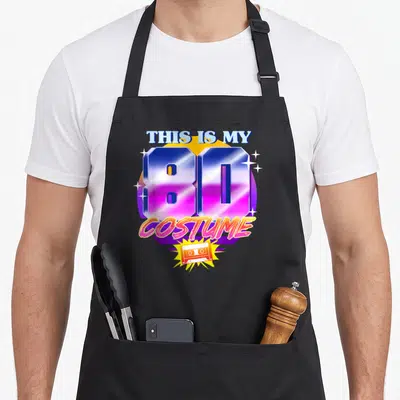 Tablier de cuisine noir avec le motif This Is My 80 Costume coloré et une illustration de cassette audio en bas.