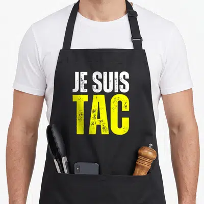 Tablier de cuisine noir avec inscription Je Suis Tac en blanc et jaune style graffiti.