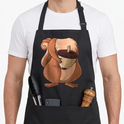 Tablier de cuisine noir avec illustration d'un écureuil sans tête tenant une noix géante sur le devant.
