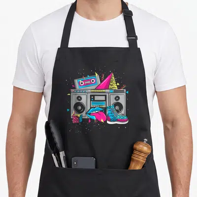 Tablier de cuisine noir avec illustration colorée d'une boombox, d'une cassette et de chaussures à pois.