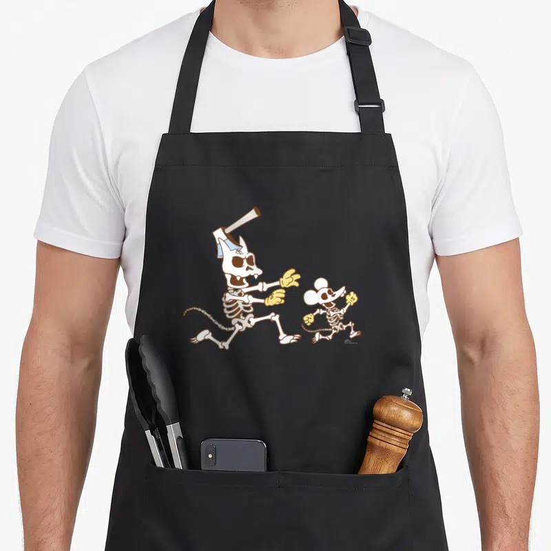 Tablier de cuisine noir avec Itchy et Scratchy squelettes en pleine course effrayante.