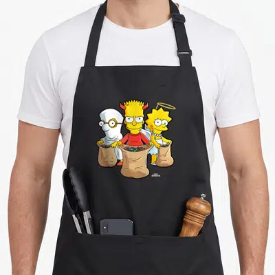 Tablier de cuisine noir avec Bart Simpson en diable, Lisa en ange et un fantôme tenant des sacs de bonbons.