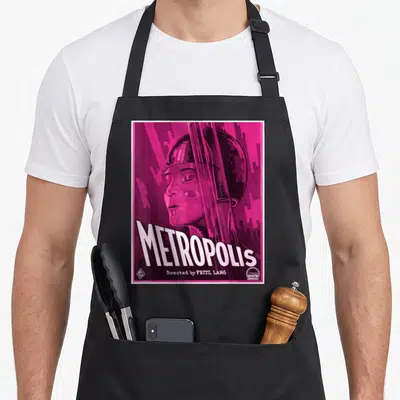 Tablier de cuisine noir avec illustration rose magenta style Metropolis Fritz Lang vintage.