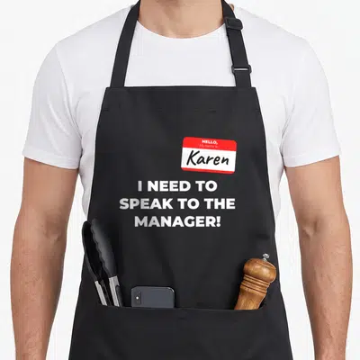Tablier de cuisine noir avec insigne Hello My name is Karen et texte blanc I need to speak to the manager.