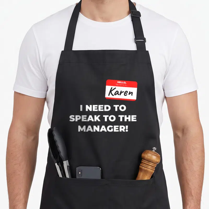 Tablier de cuisine noir avec insigne Hello My name is Karen et texte blanc I need to speak to the manager.
