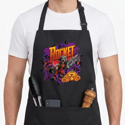 Tablier de cuisine noir avec Rocket tenant une arme, le texte Rocket et un pumpkin orné du logo du renard.