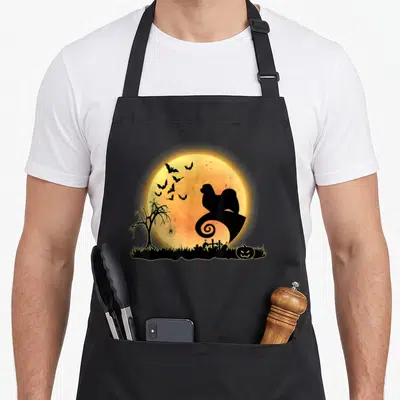 Tablier de cuisine noir avec silhouette épagneul tibétain et lune orange Halloween