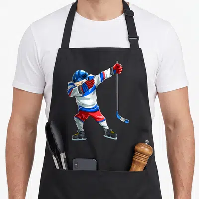 Tablier de cuisine noir avec joueur de hockey sur glace effectuant une pose de danse dab.