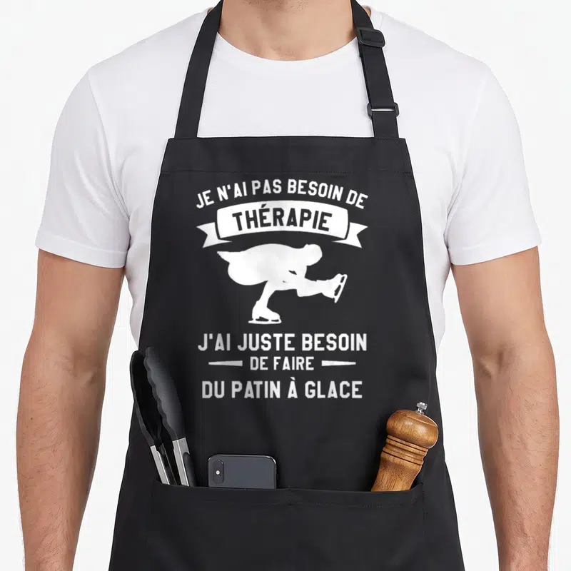 Tablier de cuisine noir avec une silhouette blanche de patineur et le texte Je n'ai pas besoin de thérapie j'ai juste besoin de faire du patin à glace.
