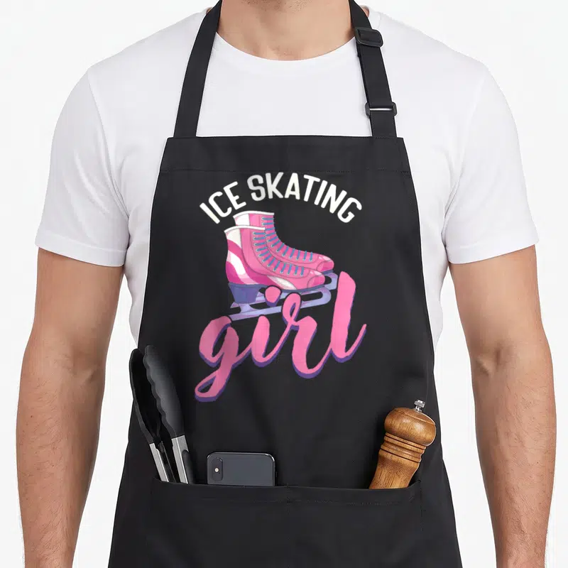 Tablier de cuisine noir avec illustration de patins à roulettes roses et texte Ice Skating girl en rose vif.