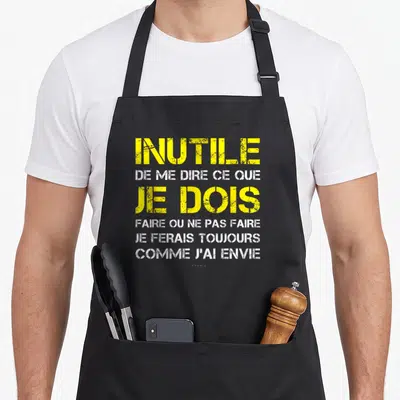 Tablier de cuisine noir avec inscription jaune et blanche Inutile de me dire ce que je dois faire ou ne pas faire.