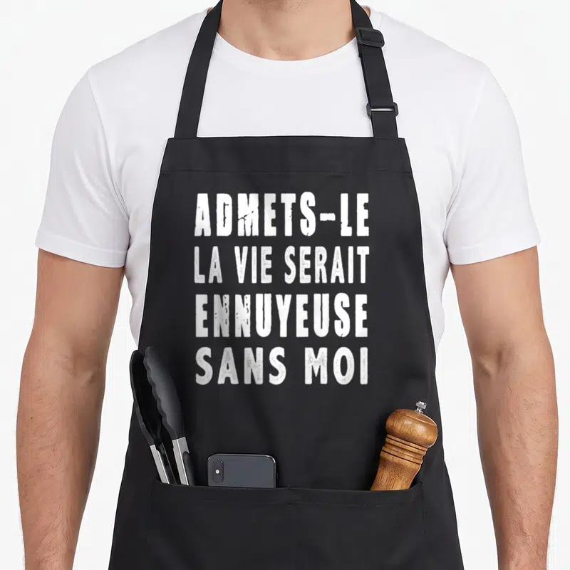 Tablier de cuisine noir avec inscription blanche admets-le la vie serait ennuyeuse sans moi en typographie épaisse.
