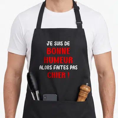 Tablier de cuisine noir avec inscription rouge et blanche Je suis de bonne humeur alors faites pas chier.