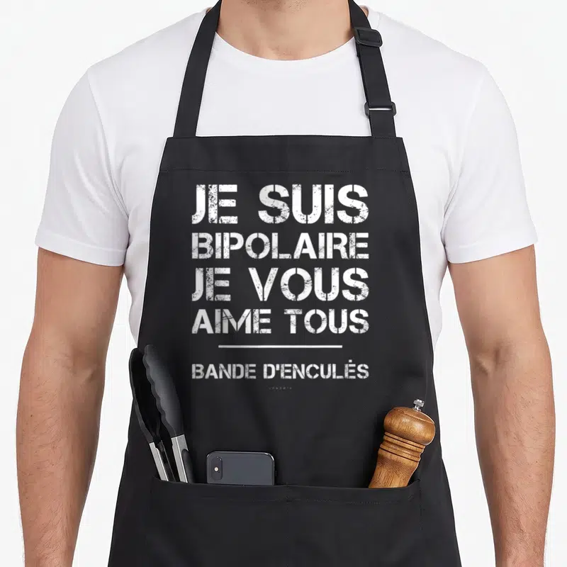 Tablier de cuisine noir avec inscription blanche Je suis bipolaire bande d'enculés en typographie détachée.
