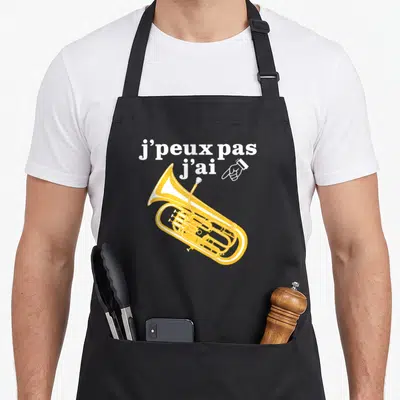 Tablier de cuisine noir avec illustration d'un euphonium jaune et texte blanc J'peux pas j'ai pointant vers l'instrument.