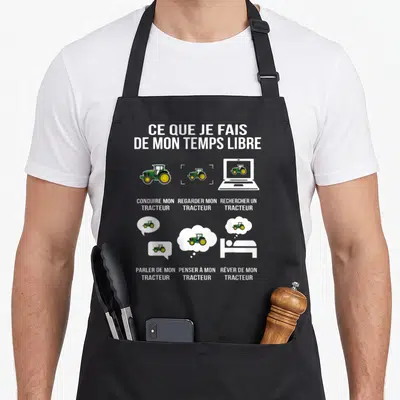 Tablier de cuisine noir avec illustration humoristique sur l'amour du tracteur et le temps libre.