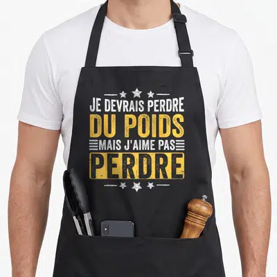 Tablier de cuisine noir avec inscription jaune et blanche Je devrais perdre du poids mais j'aime pas perdre.