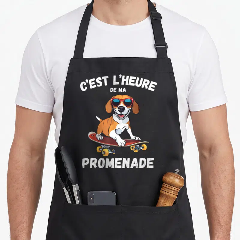 Tablier de cuisine noir avec un beagle sur skateboard portant des lunettes de soleil et du texte blanc.