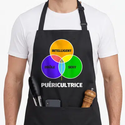 Tablier de cuisine noir avec un diagramme de Venn coloré affichant les mots intelligent, drôle et sexy au-dessus du terme puéricultrice.