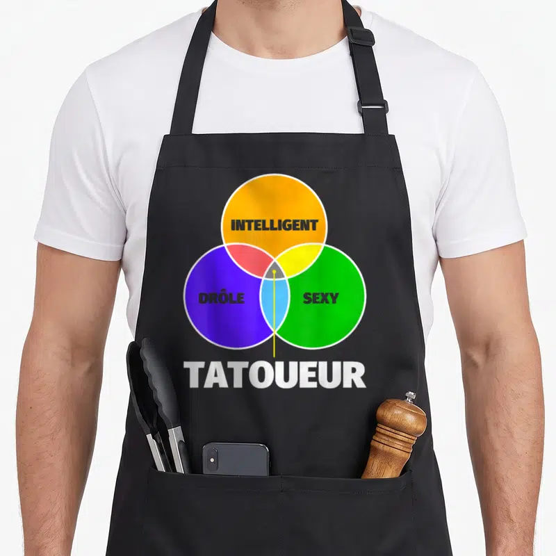 Tablier de cuisine noir avec un diagramme de Venn coloré et le mot Tatoueur en bas.