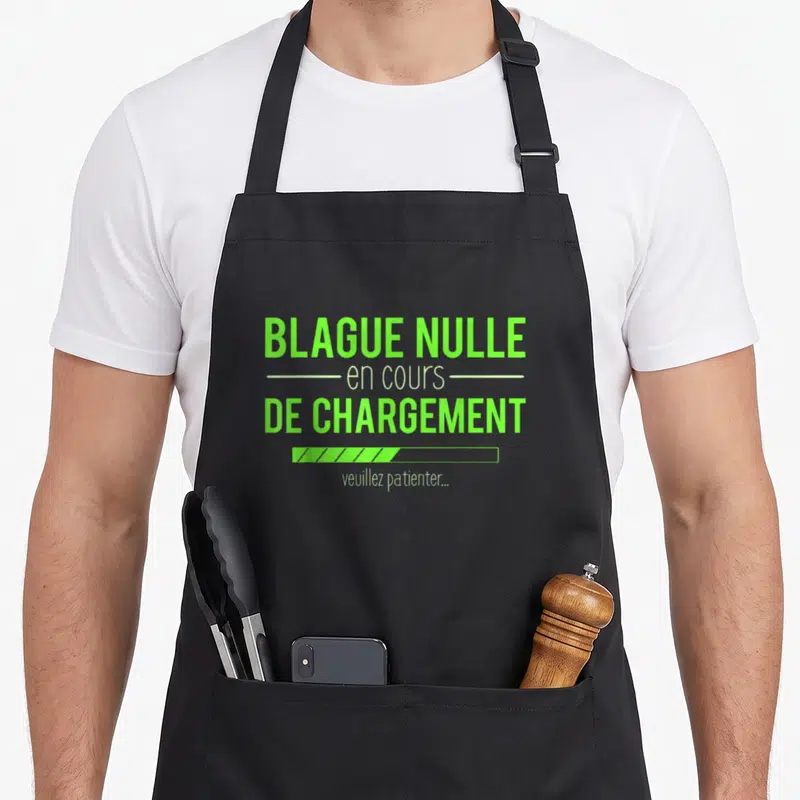 Tablier de cuisine noir avec inscription verte blague nulle en cours de chargement et barre de progression.
