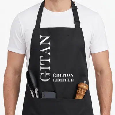 Tablier de cuisine noir avec inscription verticale Gitan et « Édition Limitée » en lettres blanches élégantes.