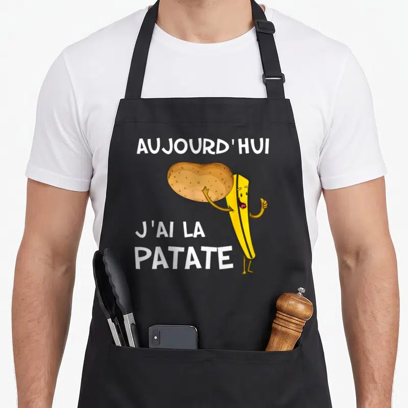 Tablier de cuisine noir avec illustration d'une frite souriante tenant une patate et le texte aujourd'hui j'ai la patate
