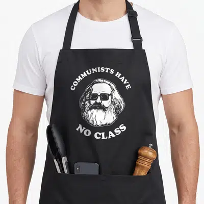Tablier de cuisine noir avec portrait de Karl Marx aux lunettes noires et texte blanc Communist Have No Class.