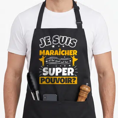 Tablier de cuisine noir avec inscription Je suis maraîcher et toi quel est ton super pouvoir en blanc et orange.
