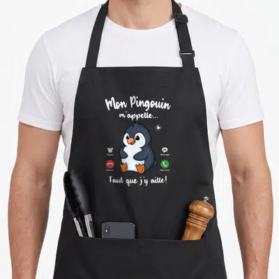 Tablier de cuisine noir avec pingouin dessiné et texte Mon Pingouin m'appelle Faut que j'y aille.