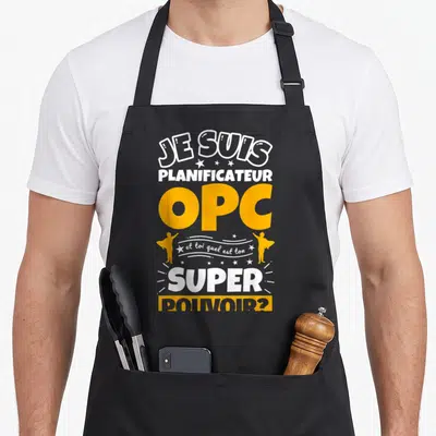 Tablier de cuisine noir avec inscription Je suis planificateur OPC et toi quel est ton super pouvoir en blanc et jaune.