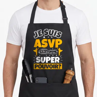 Tablier de cuisine noir avec le texte ASVP et toi quel est ton super pouvoir en orange et blanc.