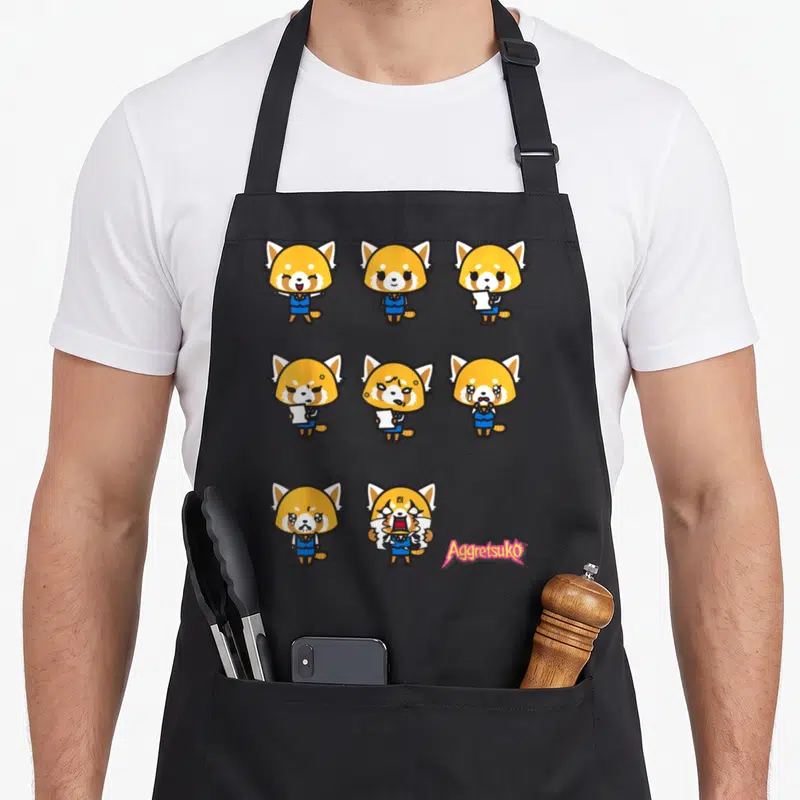 Tablier de cuisine noir avec Aggretsuko en train de pleurer, crier et tenir un papier de bureau.