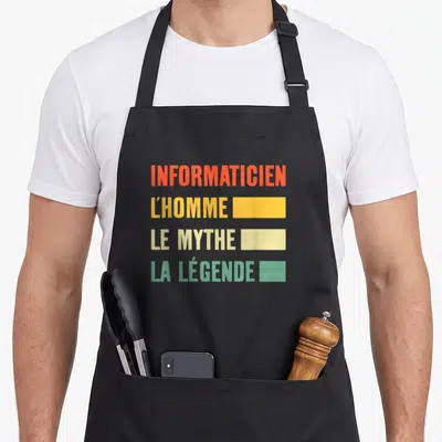Tablier de cuisine noir avec inscription colorée INFORMATICIEN L'HOMME LE MYTHE LA LÉGENDE et rectangles décoratifs.