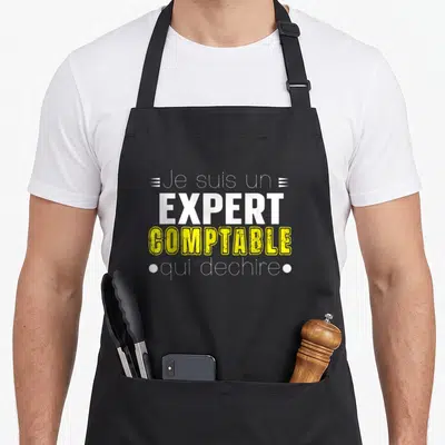 Tablier de cuisine noir avec inscription Je suis un expert comptable qui déchire en blanc et jaune.