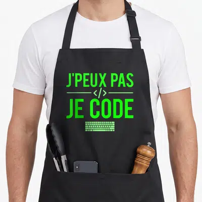 Tablier de cuisine noir avec l'inscription J'peux pas je code en vert fluo et un clavier stylisé.