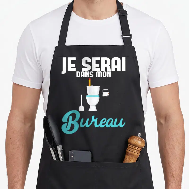 Tablier de cuisine noir avec inscription Je serai dans mon bureau au-dessus d'un dessin de toilette et d'une brosse.