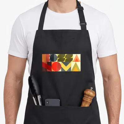 Tablier de cuisine noir avec motif rectangulaire géométrique BOSSA NOVA aux couleurs chaudes et lettres stylisées.