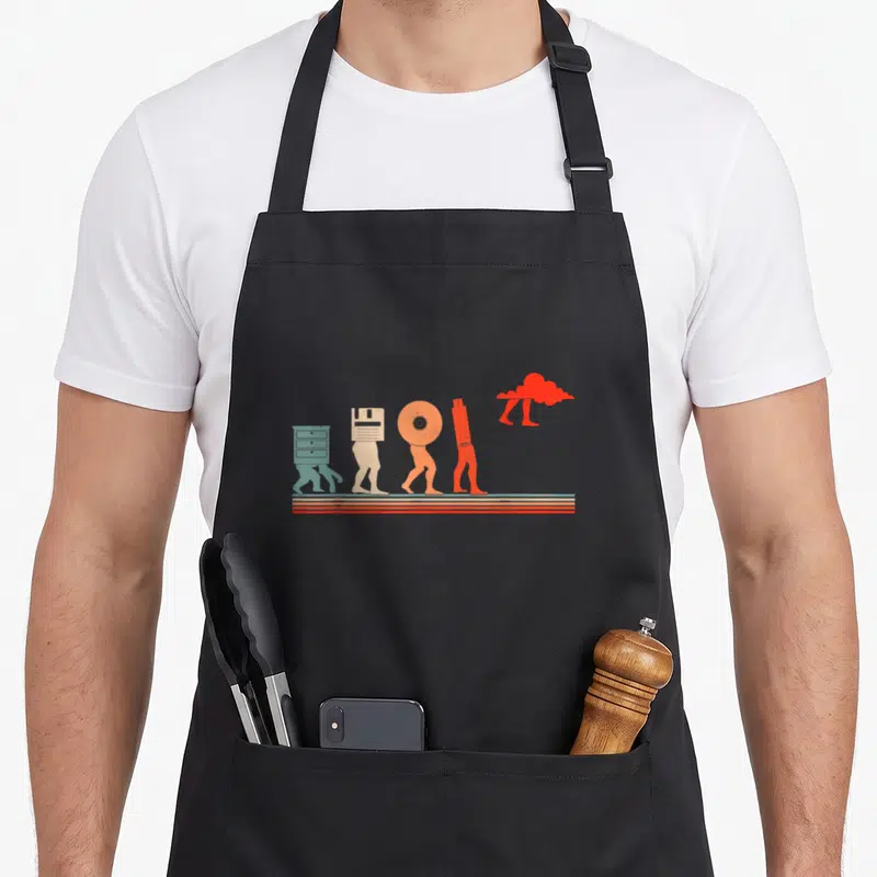 Tablier de cuisine noir avec une illustration colorée représentant l'évolution des supports de stockage vers le cloud computing.